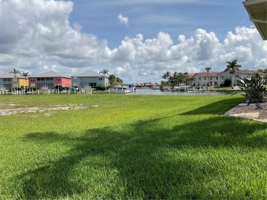 Prime Waterfront Lot with Expansive Canal View.. Discover an on Saint Andrews South Golf Club in Florida - for sale on GolfHomes.com, golf home, golf lot