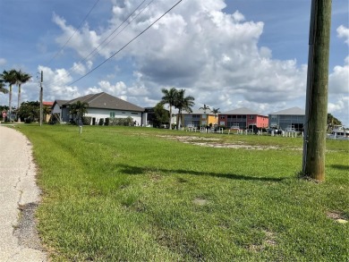 Prime Waterfront Lot with Expansive Canal View.. Discover an on Saint Andrews South Golf Club in Florida - for sale on GolfHomes.com, golf home, golf lot