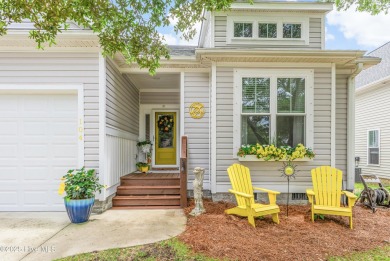 Cottage Cute, this Oak Island 3 bedroom 2 bath home is where on Founders Club At St. James Plantation in North Carolina - for sale on GolfHomes.com, golf home, golf lot