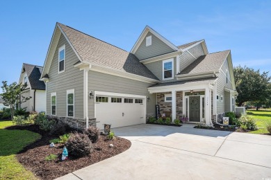 Stunning and beautifully appointed, this 3,431 heated square on Wild Wing Plantation in South Carolina - for sale on GolfHomes.com, golf home, golf lot
