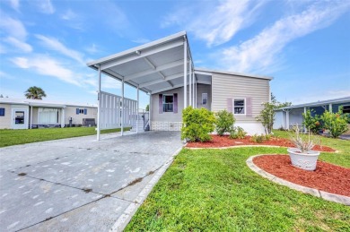 Welcome to 5748 Holiday Park Blvd.  This home is located in the on Sabal Trace Golf and Country Club in Florida - for sale on GolfHomes.com, golf home, golf lot