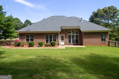 Gorgeous, all-brick, ranch home with side entry garage just on Canongate At Georgia National Golf Club in Georgia - for sale on GolfHomes.com, golf home, golf lot