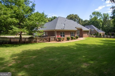 Gorgeous, all-brick, ranch home with side entry garage just on Canongate At Georgia National Golf Club in Georgia - for sale on GolfHomes.com, golf home, golf lot