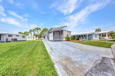 Welcome to 5748 Holiday Park Blvd.  This home is located in the on Sabal Trace Golf and Country Club in Florida - for sale on GolfHomes.com, golf home, golf lot