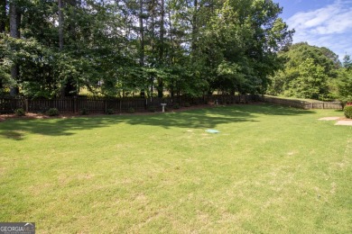 Gorgeous, all-brick, ranch home with side entry garage just on Canongate At Georgia National Golf Club in Georgia - for sale on GolfHomes.com, golf home, golf lot