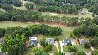 Gorgeous, all-brick, ranch home with side entry garage just on Canongate At Georgia National Golf Club in Georgia - for sale on GolfHomes.com, golf home, golf lot