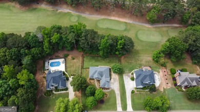Gorgeous, all-brick, ranch home with side entry garage just on Canongate At Georgia National Golf Club in Georgia - for sale on GolfHomes.com, golf home, golf lot