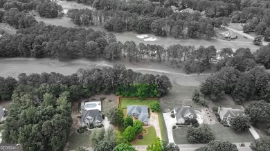 Gorgeous, all-brick, ranch home with side entry garage just on Canongate At Georgia National Golf Club in Georgia - for sale on GolfHomes.com, golf home, golf lot