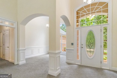 Gorgeous, all-brick, ranch home with side entry garage just on Canongate At Georgia National Golf Club in Georgia - for sale on GolfHomes.com, golf home, golf lot
