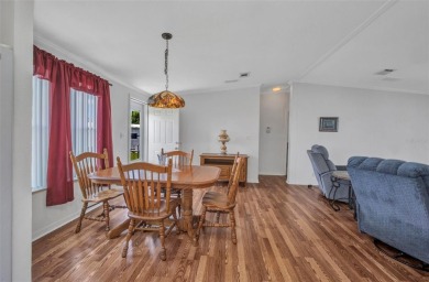 Welcome to 5748 Holiday Park Blvd.  This home is located in the on Sabal Trace Golf and Country Club in Florida - for sale on GolfHomes.com, golf home, golf lot