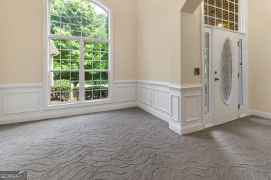 Gorgeous, all-brick, ranch home with side entry garage just on Canongate At Georgia National Golf Club in Georgia - for sale on GolfHomes.com, golf home, golf lot