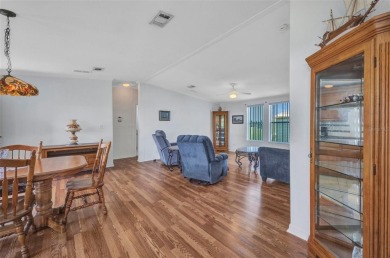 Welcome to 5748 Holiday Park Blvd.  This home is located in the on Sabal Trace Golf and Country Club in Florida - for sale on GolfHomes.com, golf home, golf lot