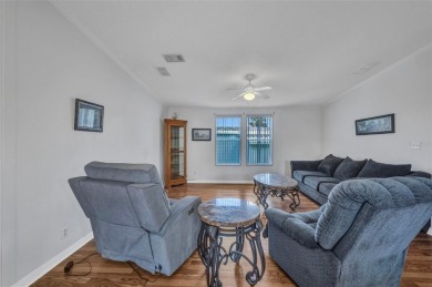 Welcome to 5748 Holiday Park Blvd.  This home is located in the on Sabal Trace Golf and Country Club in Florida - for sale on GolfHomes.com, golf home, golf lot