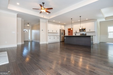 Peaceful living meets modern comfort in this stunning Canton on The Fairways at Laurel Canyon in Georgia - for sale on GolfHomes.com, golf home, golf lot