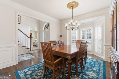 This three-sided brick traditional beauty delivers space, style on Polo Golf and Country Club in Georgia - for sale on GolfHomes.com, golf home, golf lot