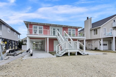 Welcome to 25 Newport Street, a breathtaking coastal retreat on Sea Trail Golf Resort in North Carolina - for sale on GolfHomes.com, golf home, golf lot