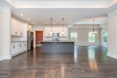 Peaceful living meets modern comfort in this stunning Canton on The Fairways at Laurel Canyon in Georgia - for sale on GolfHomes.com, golf home, golf lot