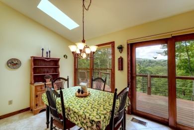 You will love coming home to this attractive and comfortable on Sapphire National Golf Club in North Carolina - for sale on GolfHomes.com, golf home, golf lot