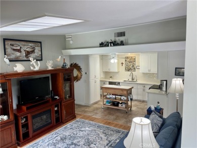 Expanded corner unit on a beautiful greenbelt!  This fully on Leisure World Seal Beach Golf Course in California - for sale on GolfHomes.com, golf home, golf lot