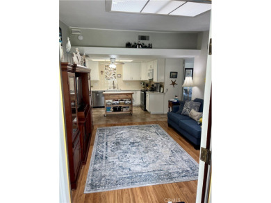 Expanded corner unit on a beautiful greenbelt!  This fully on Leisure World Seal Beach Golf Course in California - for sale on GolfHomes.com, golf home, golf lot