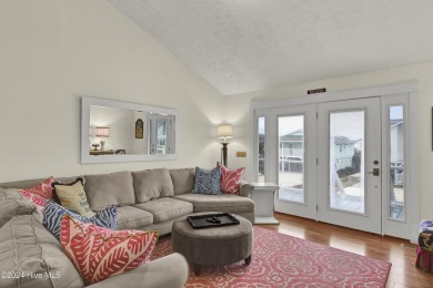 Welcome to 25 Newport Street, a breathtaking coastal retreat on Sea Trail Golf Resort in North Carolina - for sale on GolfHomes.com, golf home, golf lot