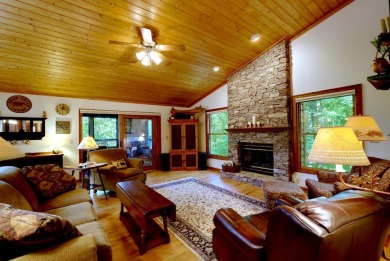 You will love coming home to this attractive and comfortable on Sapphire National Golf Club in North Carolina - for sale on GolfHomes.com, golf home, golf lot