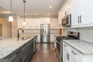 Peaceful living meets modern comfort in this stunning Canton on The Fairways at Laurel Canyon in Georgia - for sale on GolfHomes.com, golf home, golf lot