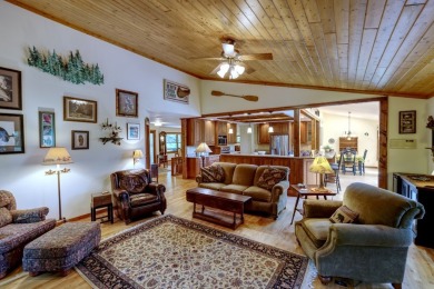 You will love coming home to this attractive and comfortable on Sapphire National Golf Club in North Carolina - for sale on GolfHomes.com, golf home, golf lot