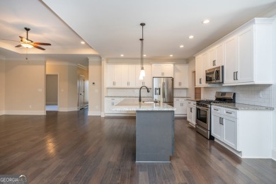 Peaceful living meets modern comfort in this stunning Canton on The Fairways at Laurel Canyon in Georgia - for sale on GolfHomes.com, golf home, golf lot