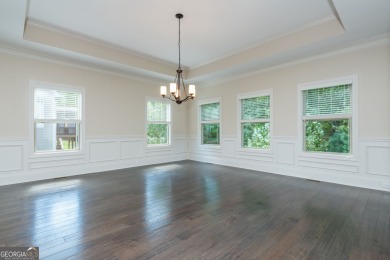 Peaceful living meets modern comfort in this stunning Canton on The Fairways at Laurel Canyon in Georgia - for sale on GolfHomes.com, golf home, golf lot