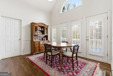 This three-sided brick traditional beauty delivers space, style on Polo Golf and Country Club in Georgia - for sale on GolfHomes.com, golf home, golf lot