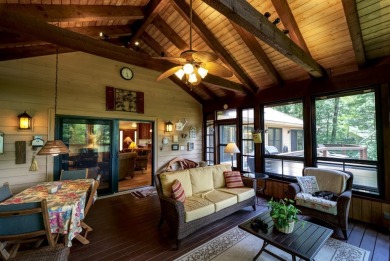 You will love coming home to this attractive and comfortable on Sapphire National Golf Club in North Carolina - for sale on GolfHomes.com, golf home, golf lot