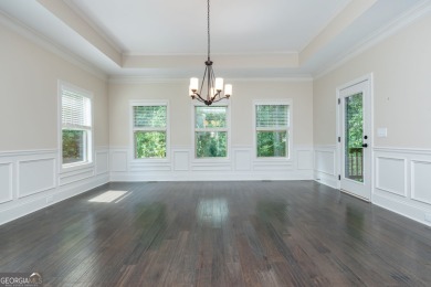 Peaceful living meets modern comfort in this stunning Canton on The Fairways at Laurel Canyon in Georgia - for sale on GolfHomes.com, golf home, golf lot
