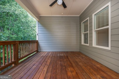 Peaceful living meets modern comfort in this stunning Canton on The Fairways at Laurel Canyon in Georgia - for sale on GolfHomes.com, golf home, golf lot