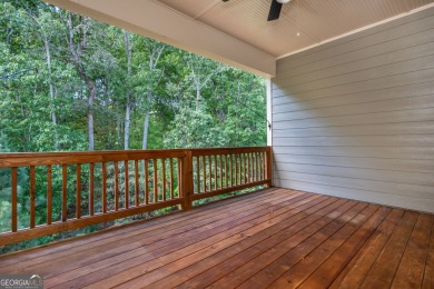 Peaceful living meets modern comfort in this stunning Canton on The Fairways at Laurel Canyon in Georgia - for sale on GolfHomes.com, golf home, golf lot