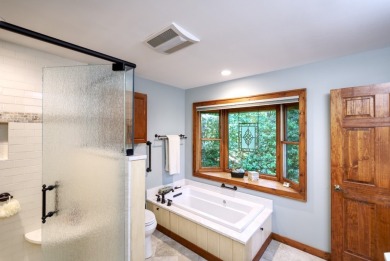 You will love coming home to this attractive and comfortable on Sapphire National Golf Club in North Carolina - for sale on GolfHomes.com, golf home, golf lot