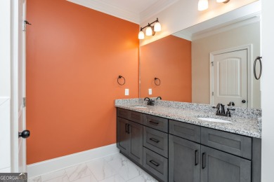 Peaceful living meets modern comfort in this stunning Canton on The Fairways at Laurel Canyon in Georgia - for sale on GolfHomes.com, golf home, golf lot