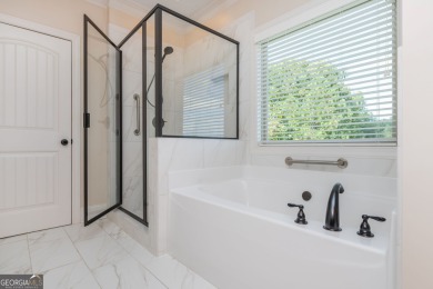 Peaceful living meets modern comfort in this stunning Canton on The Fairways at Laurel Canyon in Georgia - for sale on GolfHomes.com, golf home, golf lot