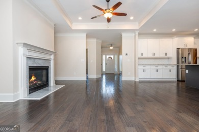 Peaceful living meets modern comfort in this stunning Canton on The Fairways at Laurel Canyon in Georgia - for sale on GolfHomes.com, golf home, golf lot
