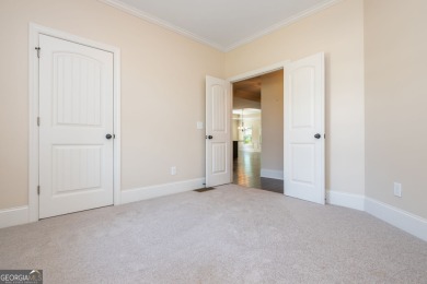 Peaceful living meets modern comfort in this stunning Canton on The Fairways at Laurel Canyon in Georgia - for sale on GolfHomes.com, golf home, golf lot