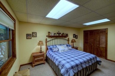 You will love coming home to this attractive and comfortable on Sapphire National Golf Club in North Carolina - for sale on GolfHomes.com, golf home, golf lot