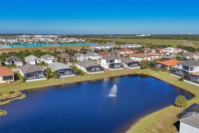 Welcome to a St Thomas lake-view model in the famous Legends Bay on IMG Academies Golf and Country Club in Florida - for sale on GolfHomes.com, golf home, golf lot