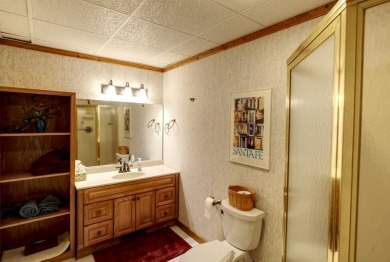 You will love coming home to this attractive and comfortable on Sapphire National Golf Club in North Carolina - for sale on GolfHomes.com, golf home, golf lot