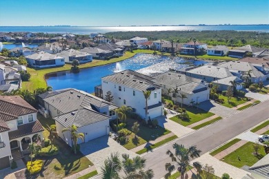 Welcome to a St Thomas lake-view model in the famous Legends Bay on IMG Academies Golf and Country Club in Florida - for sale on GolfHomes.com, golf home, golf lot