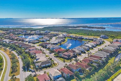 Welcome to a St Thomas lake-view model in the famous Legends Bay on IMG Academies Golf and Country Club in Florida - for sale on GolfHomes.com, golf home, golf lot