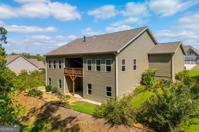 Peaceful living meets modern comfort in this stunning Canton on The Fairways at Laurel Canyon in Georgia - for sale on GolfHomes.com, golf home, golf lot