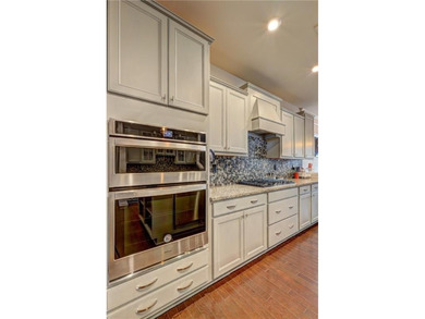 Discover the unique 3-bedroom, 3-bath Castle Rock II floor plan on Canongate Golf At Sun City Peachtree in Georgia - for sale on GolfHomes.com, golf home, golf lot