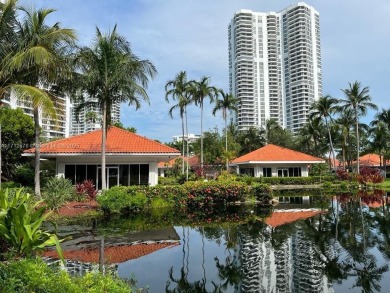 SPECTACULAR CORNER VIEWS: OCEAN GOLF COURT AND MARINAS. THIS IS on Turnberry Isle Resort and Club in Florida - for sale on GolfHomes.com, golf home, golf lot