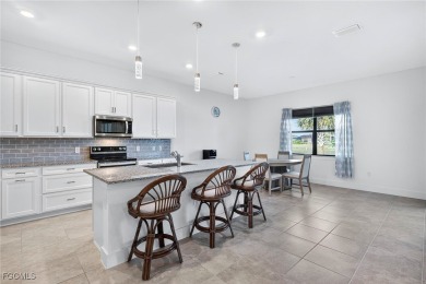 Beautiful 5 bedroom Plus a Den with 3-1/2 Bathrooms, Yorkshire on Panther Run Golf Club in Florida - for sale on GolfHomes.com, golf home, golf lot