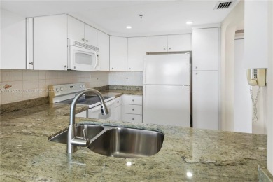 The *It* apartment with breathtaking views is for sale at a on Miami Beach Golf Club in Florida - for sale on GolfHomes.com, golf home, golf lot